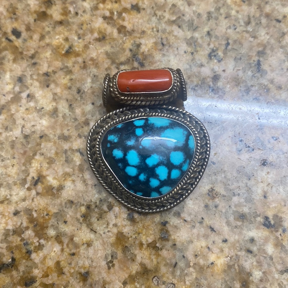 Sterling silver necklace pendant.
